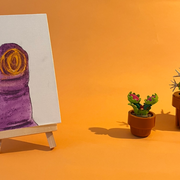 Photographie de l'oeuvre unique originale : un pouce en gros plan avec son empreinte digitale en jaune