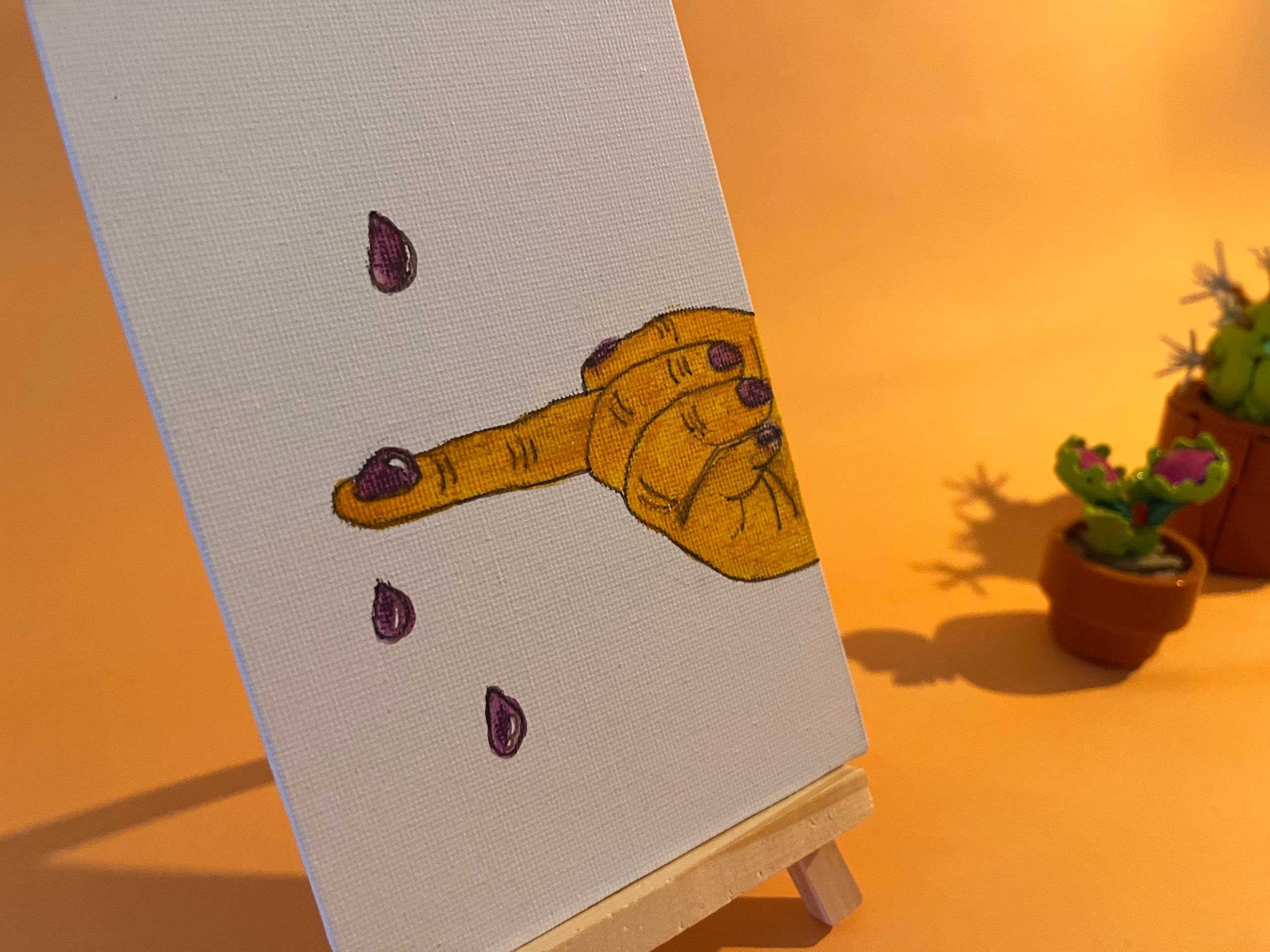 Photographie de l'oeuvre unique originale : une main attrape au vol les larmes qui tombent au sol