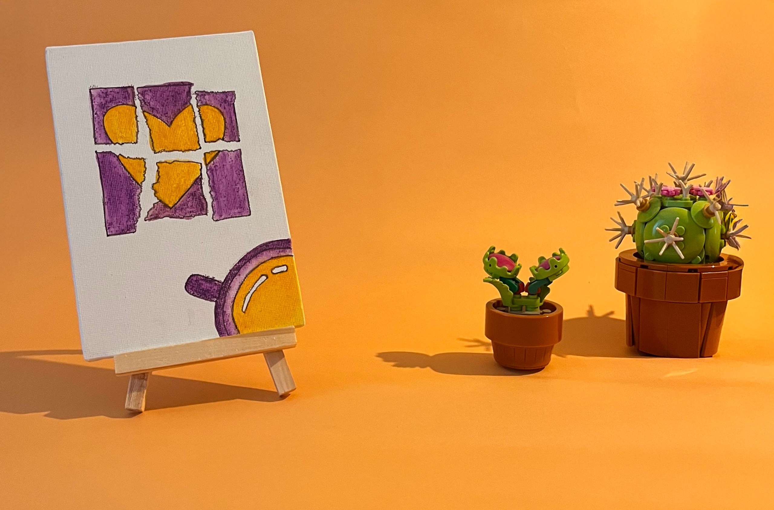 Photographie de l'oeuvre unique originale : un souvenir déchiré sur lequel un coeur est dessiné, au coin une tasse de chocolat froid